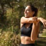 medium-shot-smiley-woman-stretching