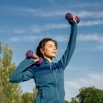 medium-shot-woman-practicing-with-dumbbells